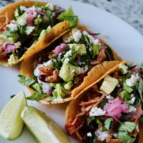 slow cooker shredded chicken for tacos with pickled red onion